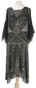 Evening dress, 1920s Georgette dress decorated with silver sequins and ...